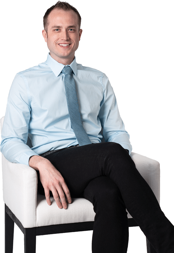 A man wearing a blue shirt and a blue tie. Description generated by AI