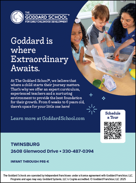 A large poster with the words Goddard School on it. Description generated by AI