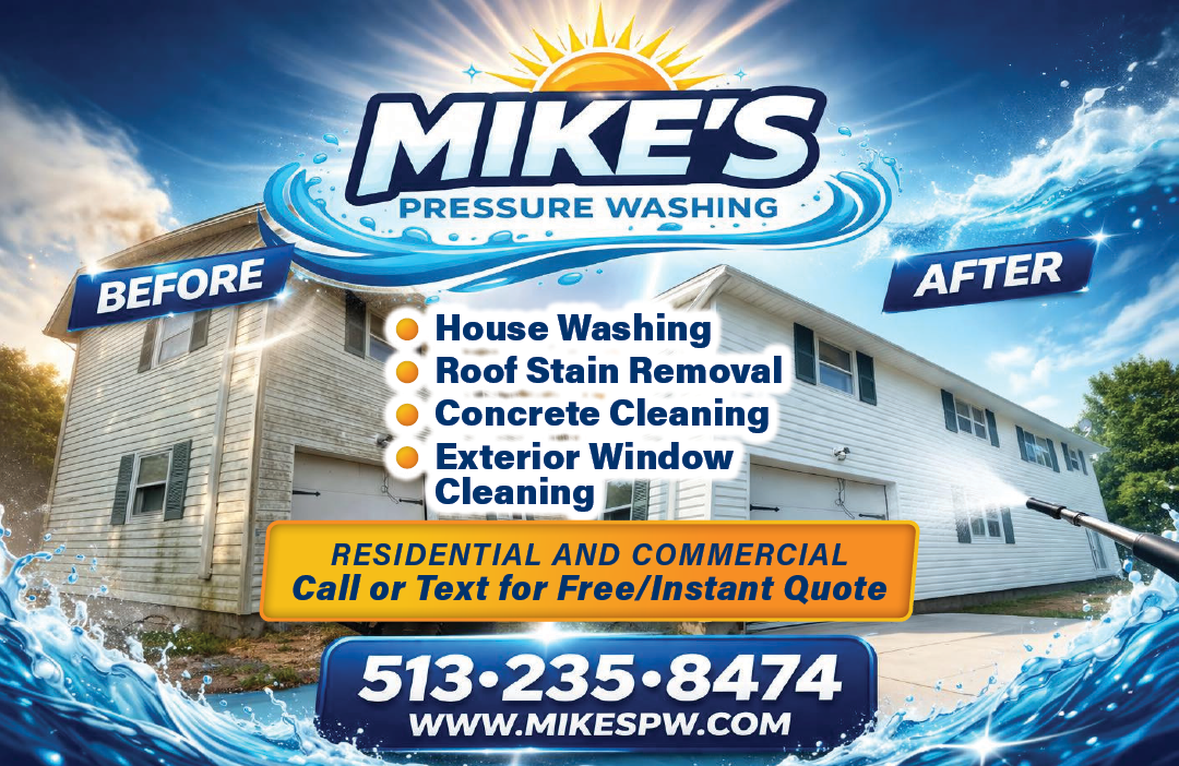 A house with a blue sign that says “Mike's Pressure Washing" on it. Description generated by AI