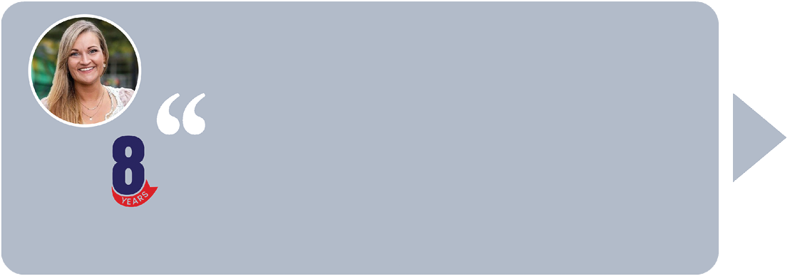 A woman with blonde hair and a blue shirt. Description generated by AI