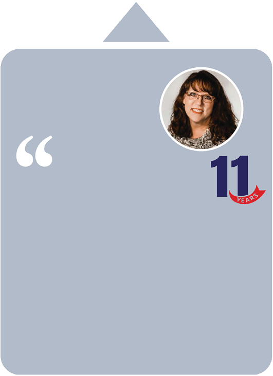 A woman is on the front of a card. Description generated by AI