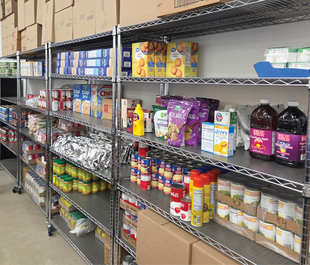 A shelf with boxes of food on it. Description generated by AI