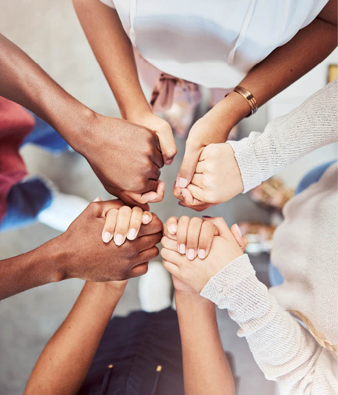 Support, prayer and trust with people holding hands in counseling for mental health, wellness or teamwork. Worship, hope and community group therapy for help, solidarity or spiritual faith from above
