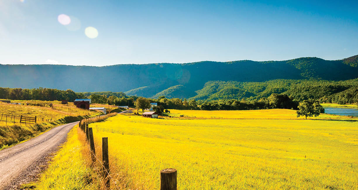 Dirt road and farm in the Shenandoah Valley, Virginia.
