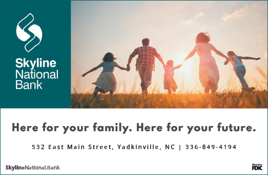 A family of four is shown running in a field, with a bank advertisement in the background. AI generated content