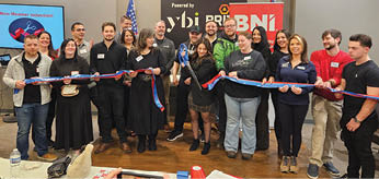 A group of people are gathered in front of a ribbon, preparing to cut it. AI generated content