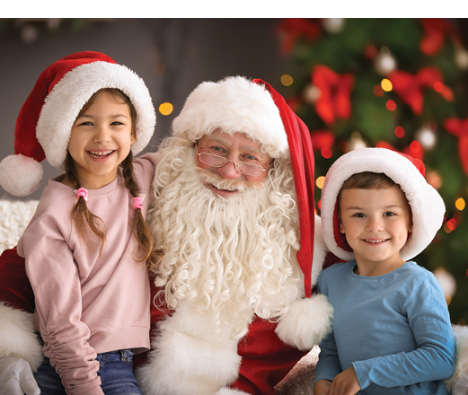 Little children sitting on authentic Santa Claus' knees indoors